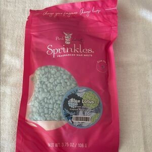 Pink Zebra Blue Lotus Wax Melts in Pink Package